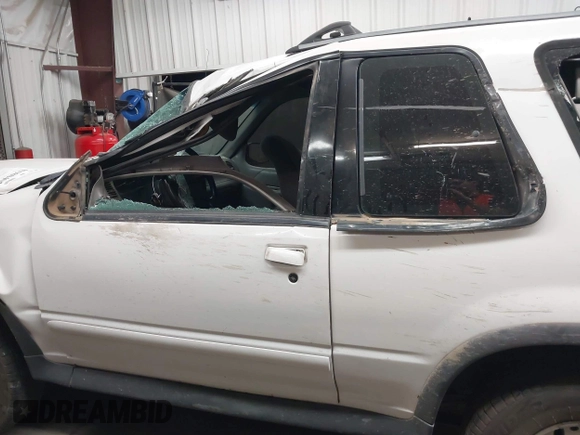 2000 Ford Explorer z VIN 1FMYU60XXYUA34664, wystawiony jako IAAI lot #41980401 z przebiegiem 179 946 mil mil oraz . Historia ofert i sprzedaży dostępna na DreamBid. Obrazek 14.