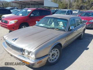 1998 Jaguar XJ Vanden Plas with VIN SAJKX6242WC823240, listed as a IAAI auction lot 41605734 with Not Provided miles and . Bid and sale history available at DreamBid. Image 2.