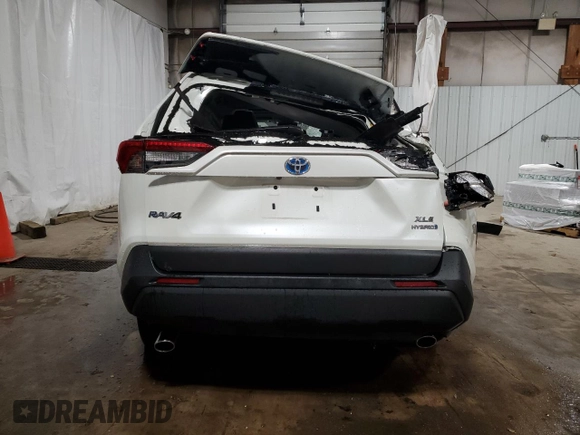 2021 Toyota RAV4 Hybrid LE with VIN 4T3B6RFV4MU025662, listed as a Copart auction lot 50709265 with 19,210 mi miles and Salvage Title. Bid and sale history available at carsss.com. Image 6.
