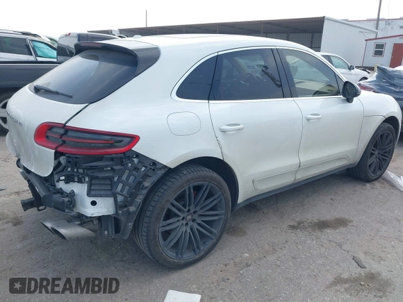 2015 Porsche Macan S with VIN WP1AB2A50FLB60518, listed as a IAAI auction lot 41797095 with 74,294 mi miles. Bid and sale history available at carsss.com. Image 4.
