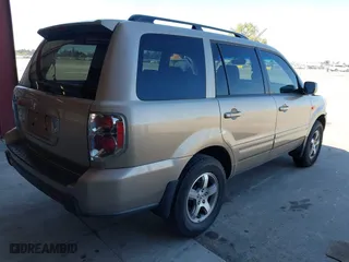 2006 Honda Pilot EX-L with RES with VIN 5FNYF28606B049523, listed as a IAAI auction lot 41736427 with 274,199 mi miles. Bid and sale history available at carsss.com. Image 4.