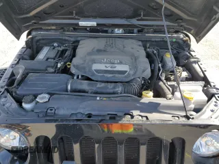 2017 Jeep Wrangler Sport with VIN 1C4AJWAGXHL715362, listed as a Copart auction lot 51262305 with 62,297 mi miles and Salvage Title. Bid and sale history available at DreamBid. Image 12.