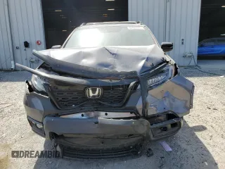 2021 Honda Passport Elite with VIN 5FNYF8H08MB014398, listed as a Copart auction lot 50499375 with 52,550 mi miles and Salvage Title. Bid and sale history available at carsss.com. Image 5.