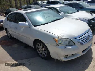 2010 Toyota Avalon XL with VIN 4T1BK3DB6AU363456, listed as a IAAI auction lot 41909395 with 251,402 mi miles and . Bid and sale history available at carsss.com. Image 1.