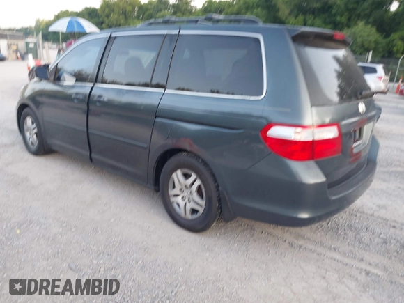 2005 Honda Odyssey EX-L with VIN 5FNRL38605B406281, listed as a IAAI auction lot 42582488 with 185,862 mi miles and . Bid and sale history available at DreamBid. Image 3.