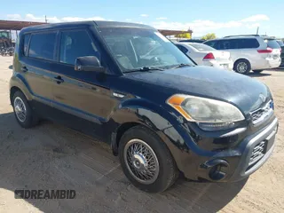 2012 Kia Soul with VIN KNDJT2A54C7431504, listed as a IAAI auction lot 42051204 with 128,119 mi miles. Bid and sale history available at carsss.com. Image 1.