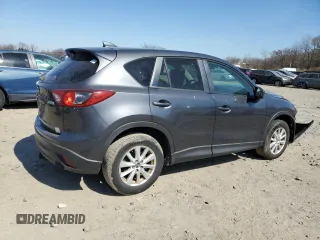 2014 Mazda CX-5 Touring with VIN JM3KE2CY0E0322059, listed as a Copart auction lot 48091805 with 212,889 mi miles and Salvage Title. Bid and sale history available at carsss.com. Image 3.