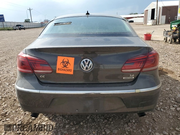 2014 Volkswagen CC VR6 Executive 4Motion with VIN WVWGU7AN9EE523145, listed as a Copart auction lot 71419134 with 94,547 mi miles and Salvage Title. Bid and sale history available at carsss.com. Image 6.