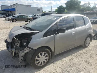 2009 Honda Fit with VIN JHMGE88259C006553, listed as a Copart auction lot 55620995 with Not provided miles and Salvage title. Bid and sale history available at DreamBid. Image 1.