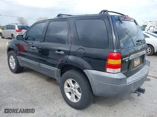 2007 Ford Escape XLT with VIN 1FMYU03127KA07084, listed as a IAAI auction lot 41931906 with 129,897 mi miles. Bid and sale history available at carsss.com. Image 3.