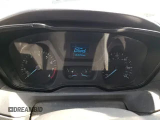 2016 Ford Transit Cargo z VIN 1FTYE1YM8GKB40975, wystawiony jako Copart lot #57044305 z przebiegiem 137 076 mil mil oraz Tytuł czysty. Historia ofert i sprzedaży dostępna na DreamBid. Obrazek 9.