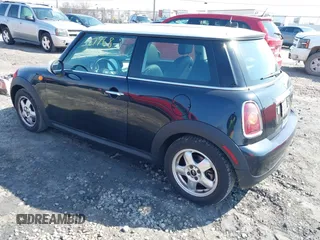 2007 MINI Hardtop with VIN WMWMF33567TT53664, listed as a IAAI auction lot 42027768 with 75,970 mi miles and . Bid and sale history available at DreamBid. Image 3.