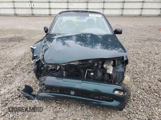 1996 Kia Sephia RS z VIN KNAFA1256T5265533, wystawiony jako Copart lot #48195555 z przebiegiem 225 062 mil mil oraz Szkody całkowita. Historia ofert i sprzedaży dostępna na DreamBid. Obrazek 5.