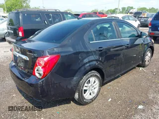2014 Chevrolet Sonic LT with VIN 1G1JC5SH8E4168554, listed as a IAAI auction lot 42129823 with 276,709 mi miles and . Bid and sale history available at DreamBid. Image 4.