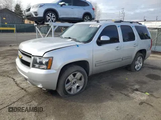 2014 Chevrolet Tahoe LT with VIN 1GNSCBE00ER146428, listed as a Copart auction lot 48148445 with 173,547 mi miles and Salvage title. Bid and sale history available at DreamBid. Image 1.