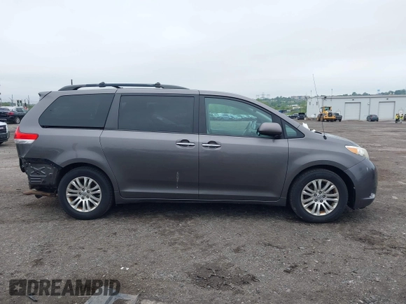 2014 Toyota Sienna XLE with VIN 5TDYK3DC0ES436502, listed as a IAAI auction lot 42180990 with 154,839 mi miles and . Bid and sale history available at DreamBid. Image 14.