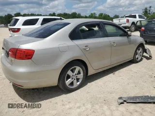 2014 Volkswagen Jetta TDI with VIN 3VWLL7AJ1EM250823, listed as a Copart auction lot 64051745 with 234,958 mi miles and Salvage title. Bid and sale history available at DreamBid. Image 3.