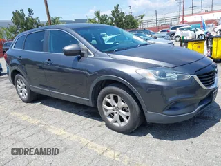 2015 Mazda CX-9 Touring z VIN JM3TB2CV0F0458812, wystawiony jako IAAI lot #42143019 z przebiegiem 147 257 mil mil oraz . Historia ofert i sprzedaży dostępna na DreamBid. Obrazek 1.