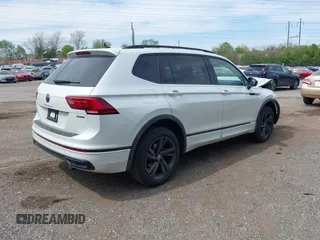 2024 Volkswagen Tiguan SE R-Line Black with VIN 3VV8B7AX9RM231038, listed as a IAAI auction lot 42092117 with 563 mi miles and . Bid and sale history available at DreamBid. Image 4.