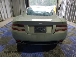 2005 Aston Martin DB9 z VIN SCFAD01A25GA00018, wystawiony jako Copart lot #84703534 z przebiegiem 19 831 mil mil oraz Tytuł czysty. Historia ofert i sprzedaży dostępna na DreamBid. Obrazek 6.