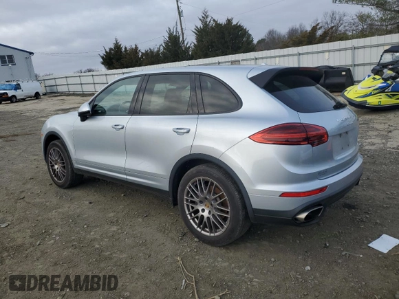 2016 Porsche Cayenne with VIN WP1AA2A28GLA02616, listed as a Copart auction lot 46328705 with 49,257 mi miles and Salvage Title. Bid and sale history available at carsss.com. Image 2.