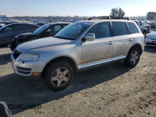 2006 Volkswagen Touareg 3.2L V6 with VIN WVGZG77L46D036735, listed as a Copart auction lot 82702694 with 159,355 mi miles and Clean Title. Bid and sale history available at DreamBid. Image 1.