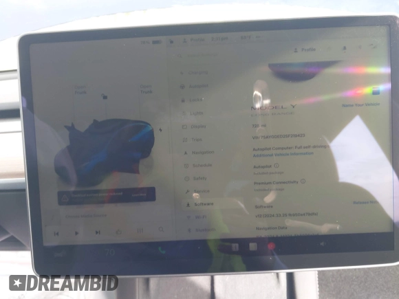 2025 Tesla Model Y Long Range with VIN 7SAYGDED2SF219423, listed as a IAAI auction lot 40984912 with 728 mi miles and . Bid and sale history available at DreamBid. Image 15.