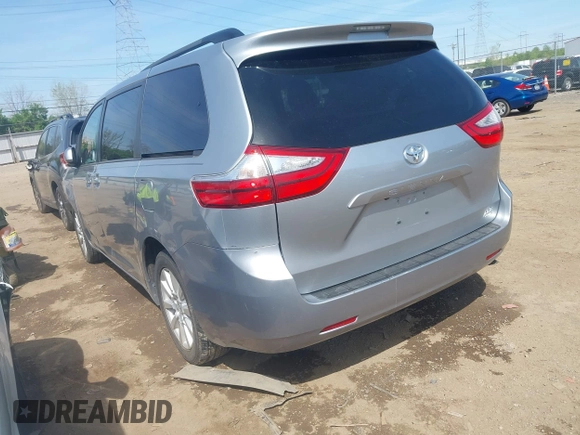 2017 Toyota Sienna LE with VIN 5TDJZ3DC2HS166433, listed as a IAAI auction lot 42084039 with 121,540 mi miles and . Bid and sale history available at DreamBid. Image 3.