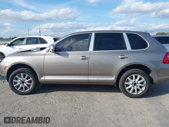 2005 Porsche Cayenne S with VIN WP1AB29P75LA61263, listed as a IAAI auction lot 41635350 with 242,874 mi miles. Bid and sale history available at carsss.com. Image 15.