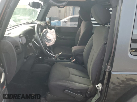 2017 Jeep Wrangler Willys Wheeler with VIN 1C4AJWAG1HL624254, listed as a Copart auction lot 42678975 with 51,936 mi miles and Salvage Title. Bid and sale history available at DreamBid. Image 7.
