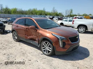 2019 Cadillac XT4 AWD Sport with VIN 1GYFZFR42KF136567, listed as a Copart auction lot 52018445 with 99,944 mi miles and Salvage title. Bid and sale history available at DreamBid. Image 4.