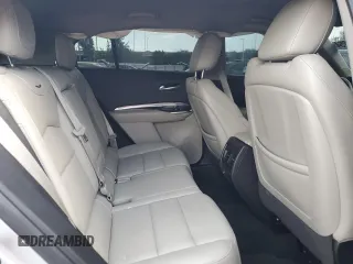 2019 Cadillac XT4 FWD Luxury z VIN 1GYAZAR42KF119510, wystawiony jako Copart lot #86727814 z przebiegiem 57 498 mil mil oraz Szkoda całkowita • Salvage title. Historia ofert i sprzedaży dostępna na DreamBid. Obrazek 11.