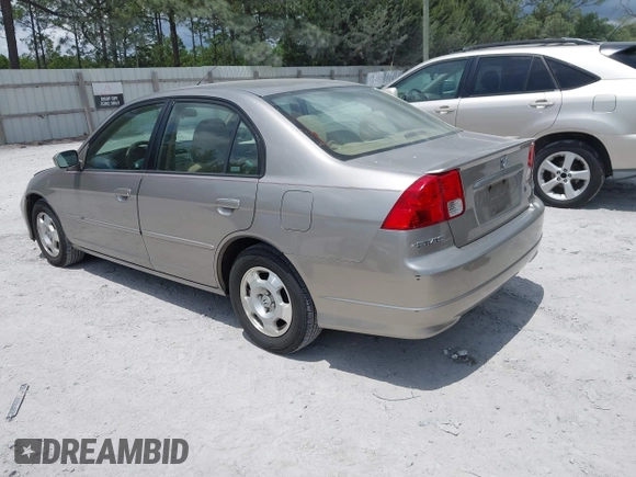 2004 Honda Civic Hybrid with VIN JHMES95644S021296, listed as a IAAI auction lot 42153296 with 281,563 mi miles. Bid and sale history available at carsss.com. Image 3.