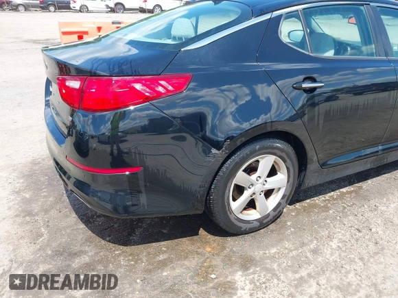 2015 Kia Optima LX with VIN 5XXGM4A71FG387980, listed as a IAAI auction lot 42330602 with 96,189 mi miles and . Bid and sale history available at DreamBid. Image 6.