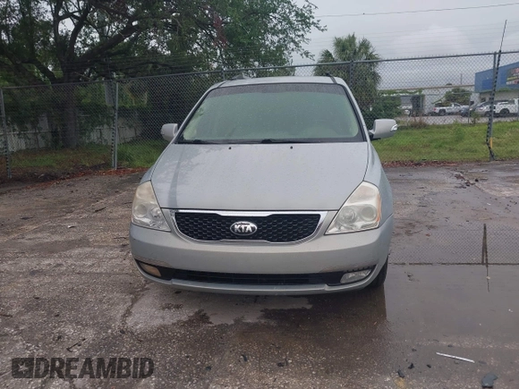 2014 Kia Sedona EX with VIN KNDMH4C74E6578326, listed as a IAAI auction lot 41990311 with 220,772 mi miles. Bid and sale history available at carsss.com. Image 6.