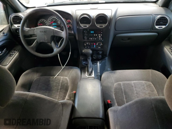 2004 GMC Envoy SLT with VIN 1GKDT13S042257444, listed as a Copart auction lot 89137605 with 301,920 mi miles and Salvage Title. Bid and sale history available at carsss.com. Image 8.