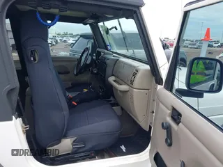 2003 Jeep Wrangler Sport with VIN 1J4FA49S43P362339, listed as a IAAI auction lot 41452901 with 208,128 mi miles and . Bid and sale history available at DreamBid. Image 5.