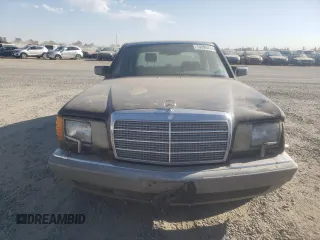 1988 Mercedes-Benz 420 with VIN WDBCA35D5JA388327, listed as a Copart auction lot 74394414 with 299,950 mi miles and Salvage Title. Bid and sale history available at carsss.com. Image 5.