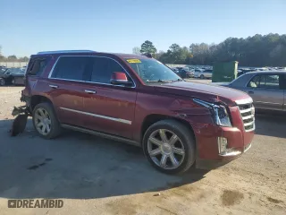 2020 Cadillac Escalade Premium Luxury with VIN 1GYS4CKJ7LR102961, listed as a Copart auction lot 48673875 with 142,808 mi miles and Salvage Title. Bid and sale history available at carsss.com. Image 4.