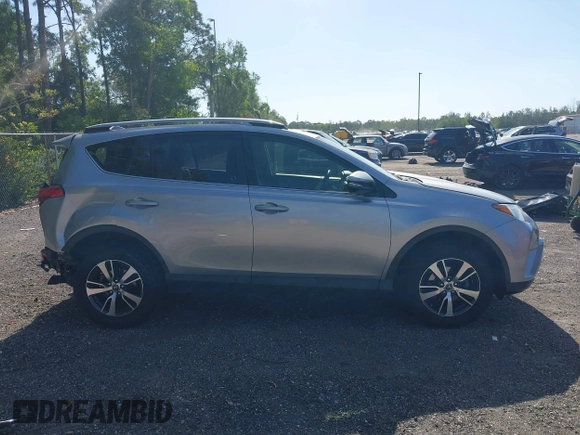 2018 Toyota RAV4 XLE with VIN JTMWFREV9JJ203353, listed as a IAAI auction lot 42129995 with 41,806 mi miles and . Bid and sale history available at DreamBid. Image 14.