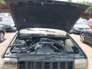 1996 Jeep Grand Cherokee Limited with VIN 1J4GZ78Y9TC351364, listed as a IAAI auction lot 42368001 with 254,634 mi miles and . Bid and sale history available at DreamBid. Image 10.