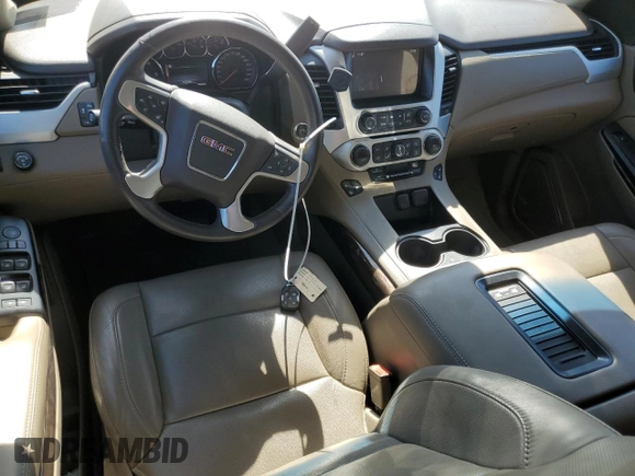 2016 GMC Yukon SLT with VIN 1GKS1BKC4GR138658, listed as a Copart auction lot 76634664 with 132,358 mi miles and Salvage Title. Bid and sale history available at carsss.com. Image 8.