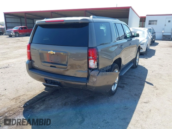 2016 Chevrolet Tahoe LT with VIN 1GNSKBKC9GR434579, listed as a IAAI auction lot 42080094 with 137,910 mi miles and . Bid and sale history available at DreamBid. Image 4.