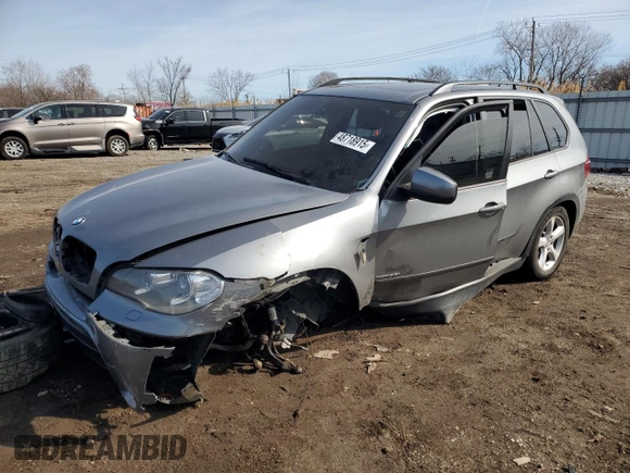 2012 BMW X5 35i with VIN 5UXZV4C51CL764495, listed as a Copart auction lot 48718915 with Not provided miles and Salvage title. Bid and sale history available at DreamBid. Image 1.