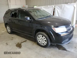 2017 Dodge Journey SE with VIN 3C4PDCABXHT506356, listed as a Copart auction lot 52409805 with 146,782 mi miles and Salvage Title. Bid and sale history available at DreamBid. Image 4.