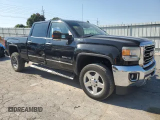 2015 GMC Sierra 2500HD SLT with VIN 1GT12ZEG4FF160722, listed as a Copart auction lot 75458644 with 337,580 mi miles and Salvage title. Bid and sale history available at DreamBid. Image 4.