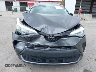 2021 Toyota C-HR LE with VIN NMTKHMBX0MR135693, listed as a IAAI auction lot 42071766 with 73,407 mi miles and . Bid and sale history available at DreamBid. Image 13.