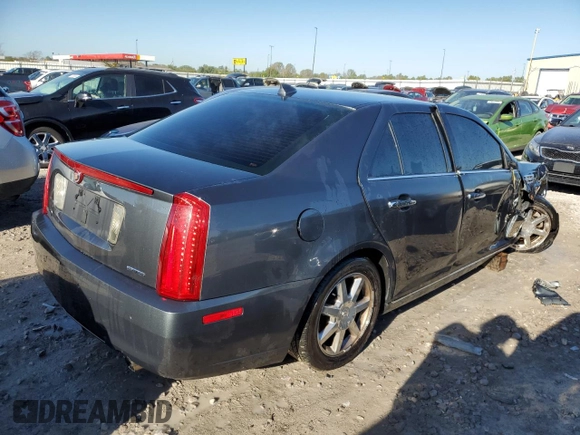 2009 Cadillac STS RWD z VIN 1G6DW67V390104597, wystawiony jako Copart lot #73794724 z przebiegiem Nie podano mil oraz Szkoda całkowita • Salvage title. Historia ofert i sprzedaży dostępna na DreamBid. Obrazek 3.