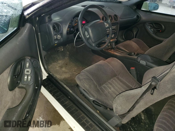 1998 Pontiac Firebird Firebird z VIN 2G2FS22KXW2207621, wystawiony jako Copart lot #82717434 z przebiegiem 63 973 mil mil oraz Szkoda całkowita • Salvage title. Historia ofert i sprzedaży dostępna na DreamBid. Obrazek 8.