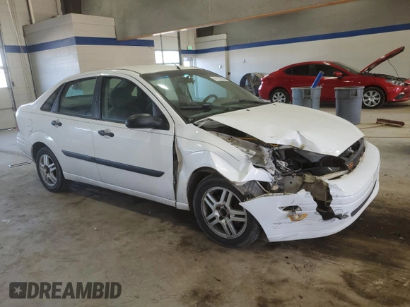 2003 Ford Focus LX with VIN 1FAFP33P43W201570, listed as a Copart auction lot 43130555 with 222,727 mi miles and Salvage Title. Bid and sale history available at carsss.com. Image 4.